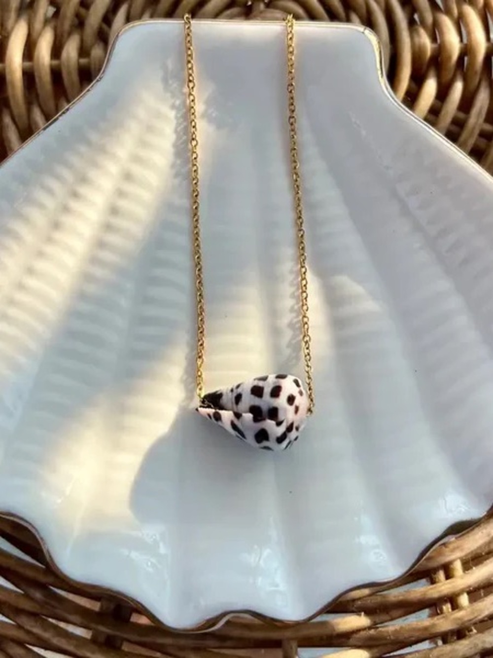 Gold Chain Necklace with White and Black Speckled Shell Pendant